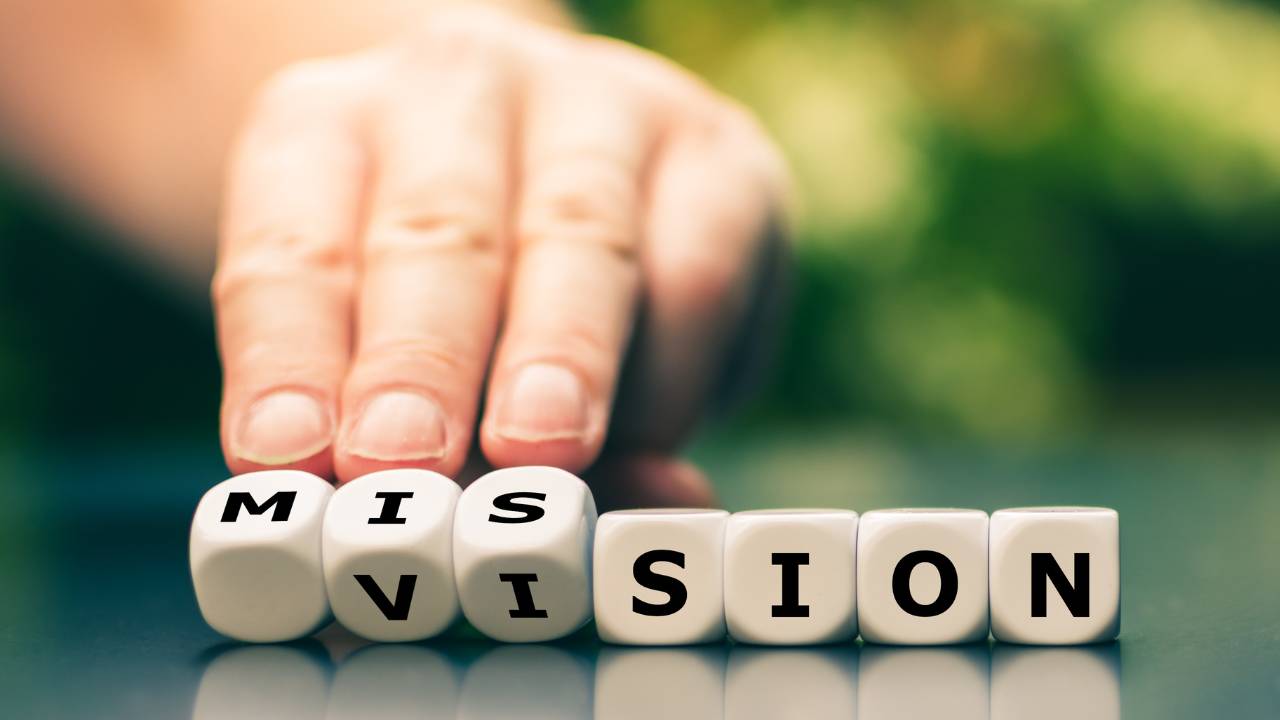 mission vision als letters op dobbelstenen